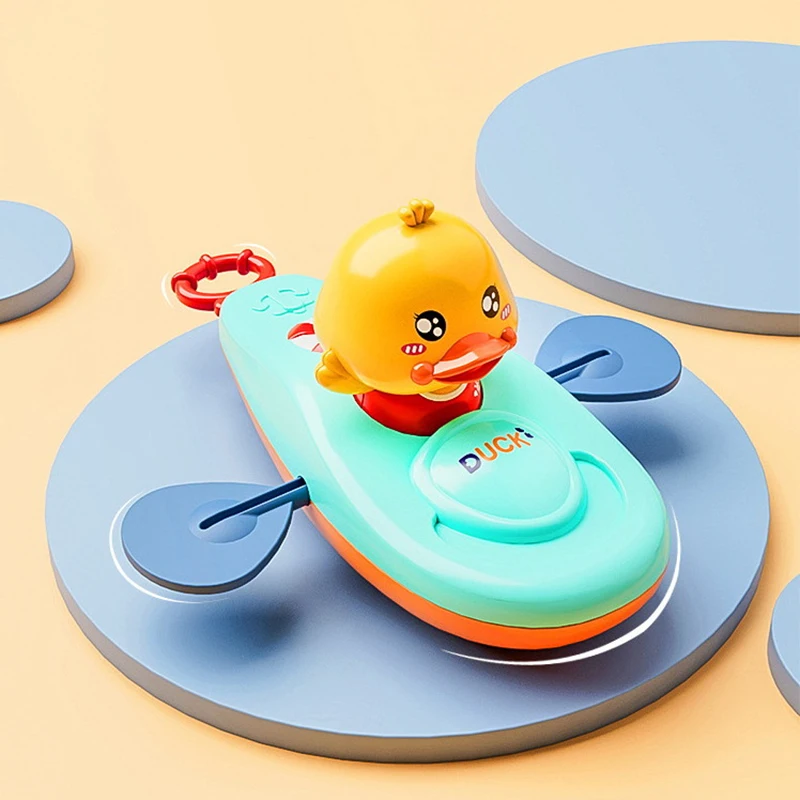 Juguete de agua clásico para niños, accesorios de baño de dibujos animados de pato, barco de remos trasero, cadena de pato para nadar, juguete de relojería para niños, 1 unidad