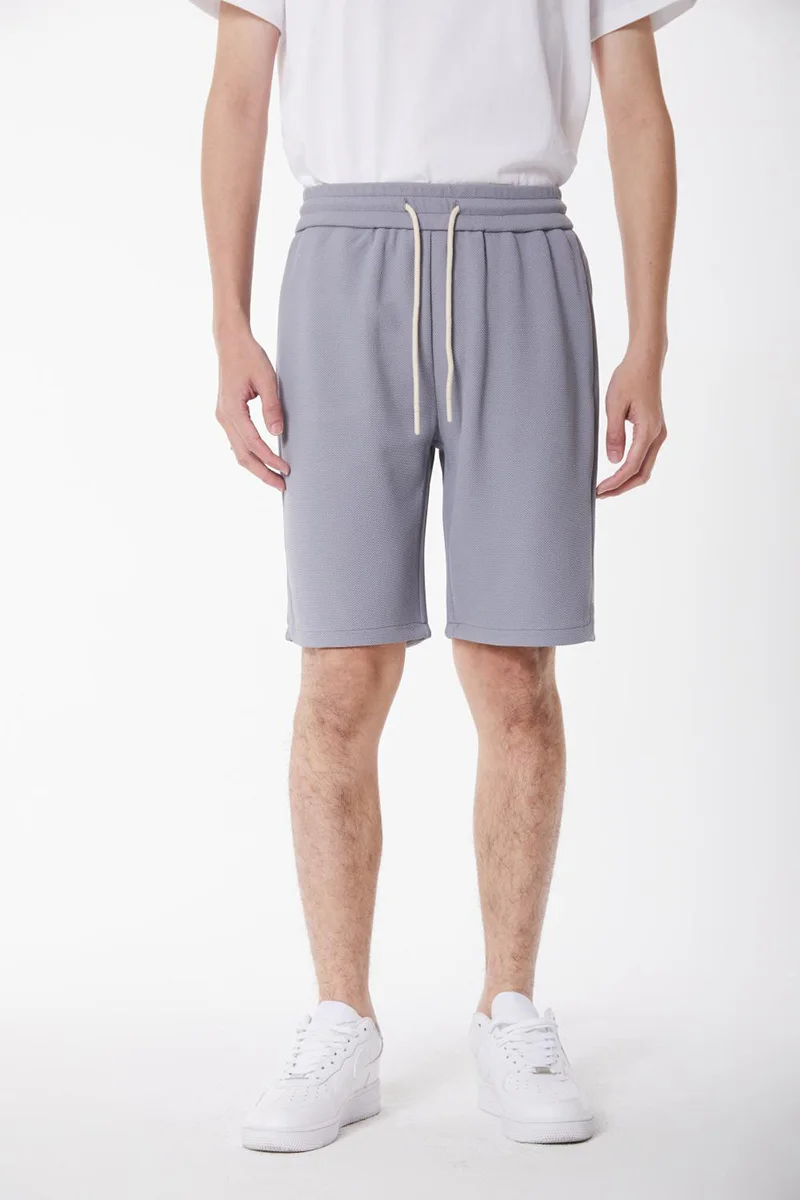 Demi-short décontracté uni pour homme, couleur unie, piqué adt, ceinture élastique, proximité, wstring, réglage, mode, court avec poches latérales