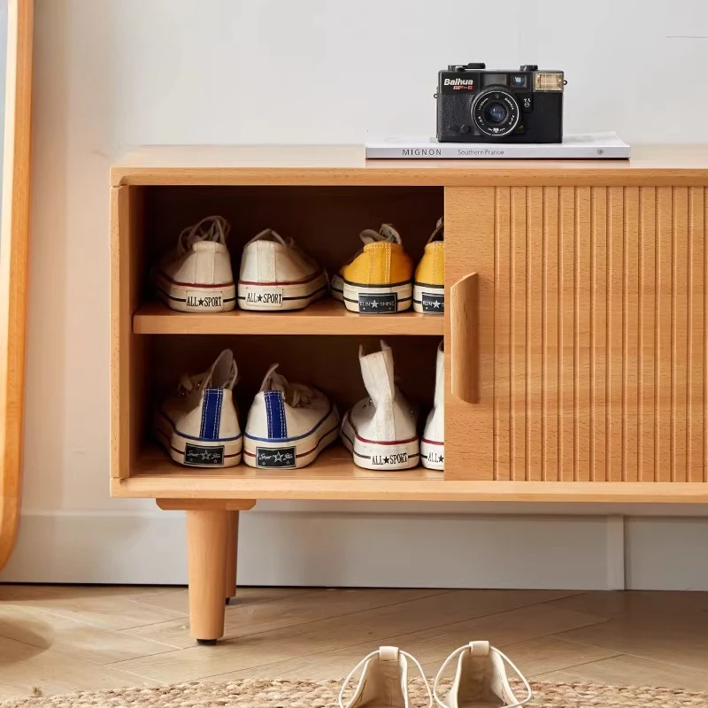 

Solid wood shoe changing stool is integrated with a shoe cabinet stool at the entrance of the house