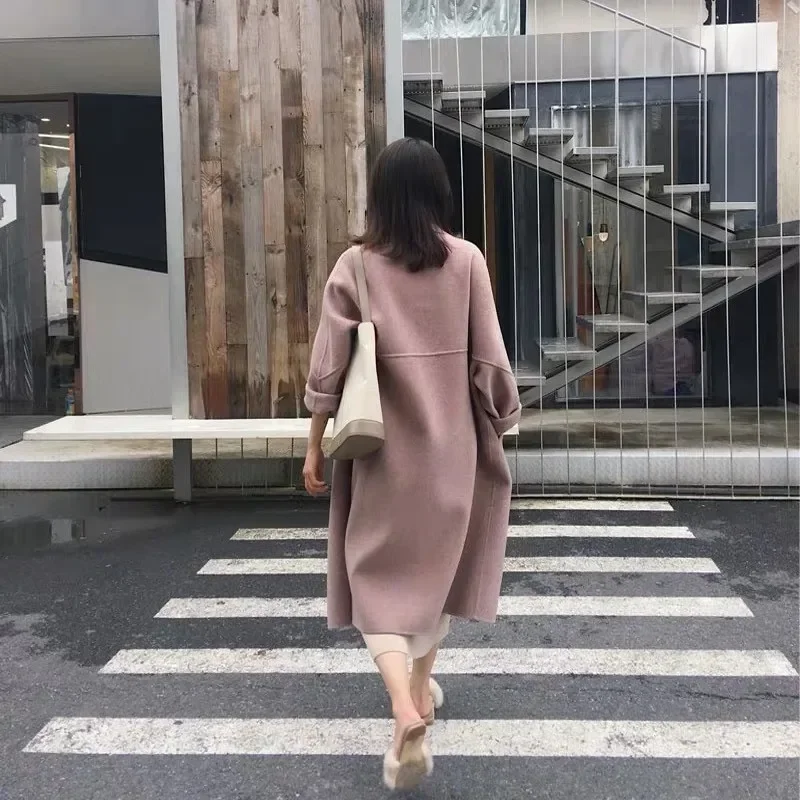 

Pink woolen coat women's autumn and winter new celebrity temperament loose Korean version fashion long knee coat