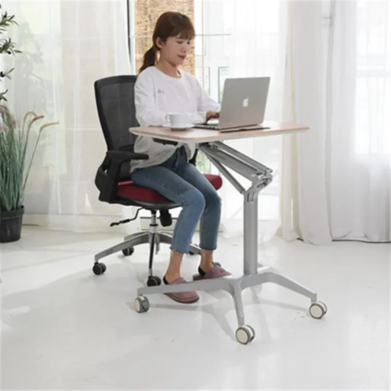 Mobile height-adjustable laptop desk/lectern on wheels (height range: 77.5 cm–107 cm), supporting sit-stand work.