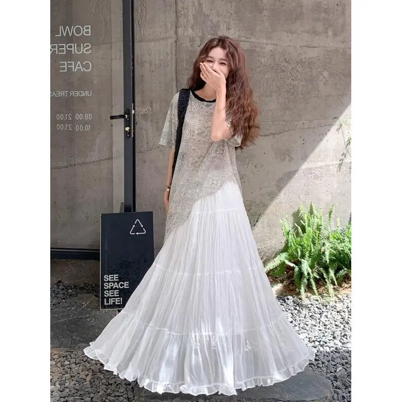 

Женский модный костюм из двух предметов: рубашка с коротким рукавом нестандартного кроя и юбка с эластичной талией, хлопковый, летний, стильный и красивый.