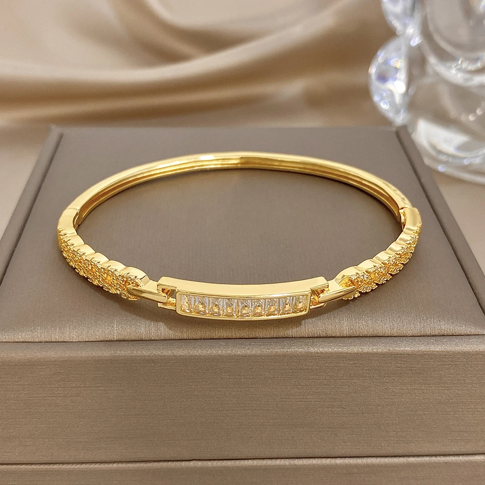 

DODOHAO Classic Square Rhinestone Inlaid Twisted Bangle for Women Glossy Gold Plated Spring Cuff Bracelet Holiday Jewelry Gift