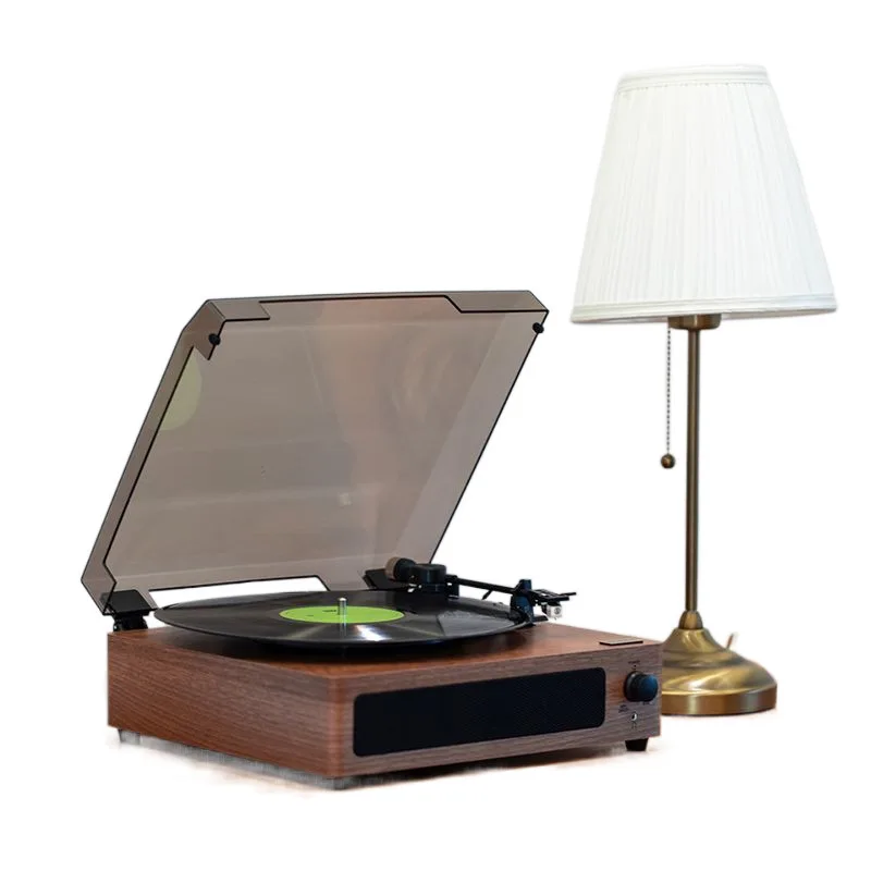 

Antique vinyl record player, power-operated dynamic magnetic record head, Bluetooth connection, wired.
