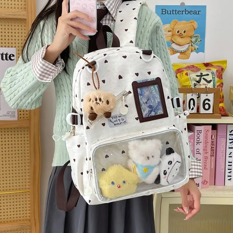 Cute girl's heart-shaped backpack, a stylish and attractive school bag for middle school girls, in a Korean styleinsNiche backpa