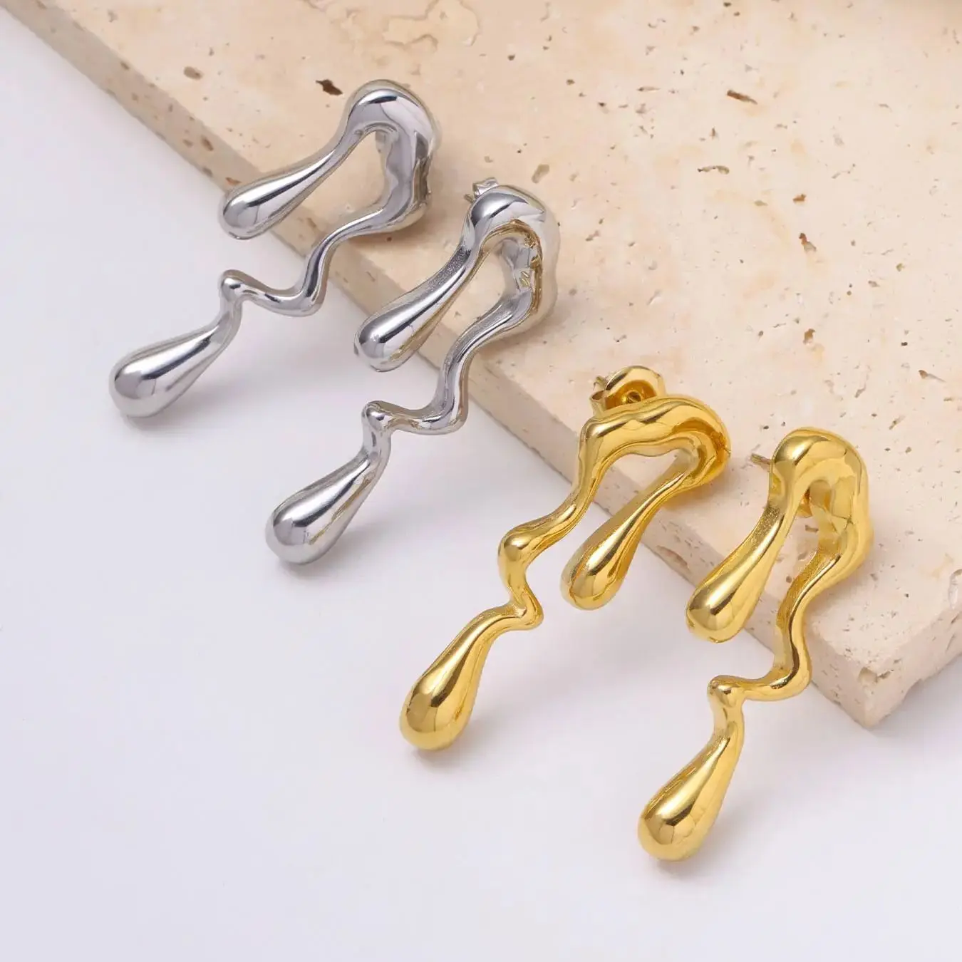 CARLIDANA Unique Female Statement Stainless Steel Earrings Luxury Irregular Teardrop Asymmetric Melting Ice Design Stud Earrings