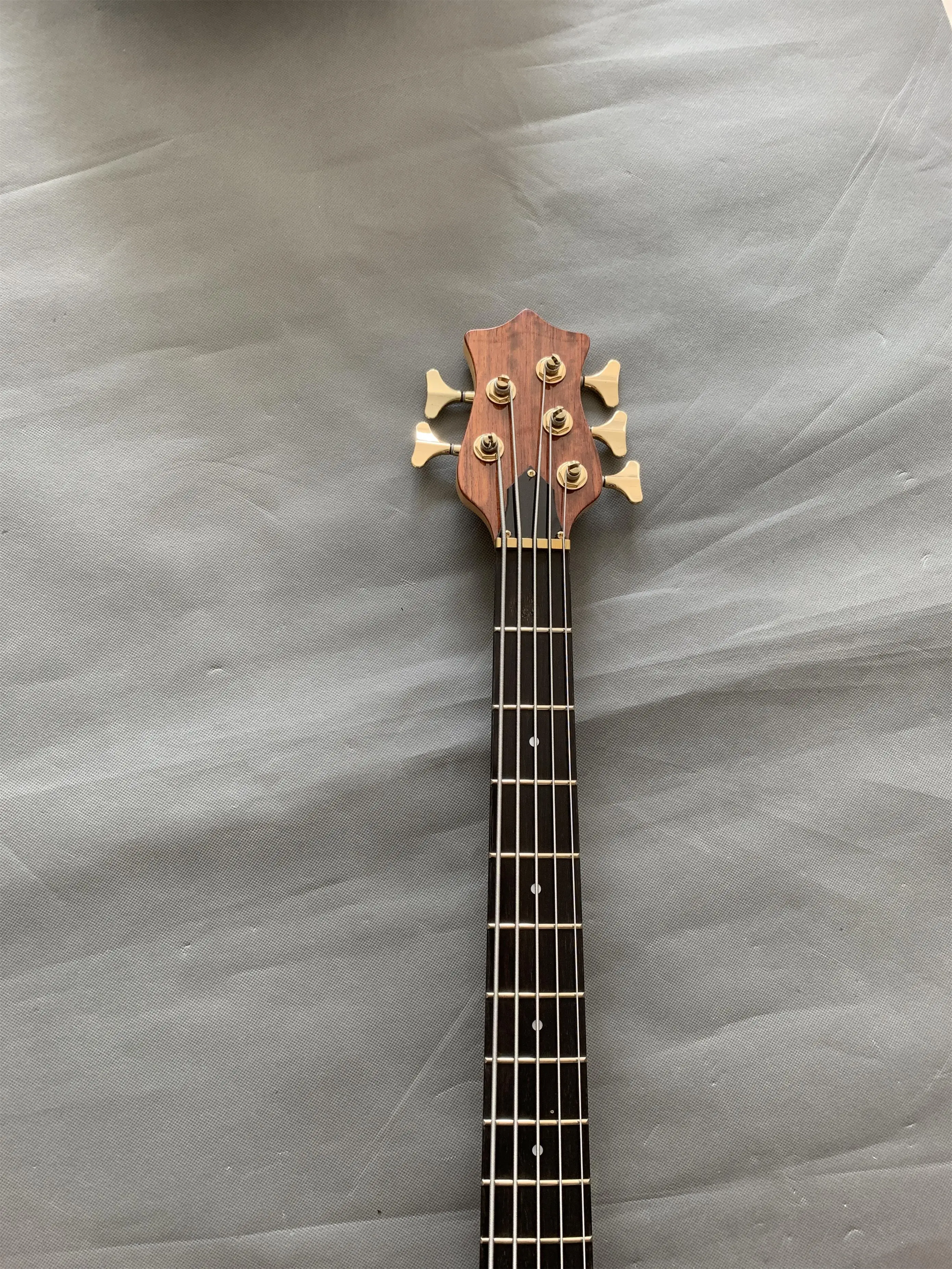 Factory direct sales, high-end customized 5 string bass electric guitar, through-body design, red flower pear veneer, active pic