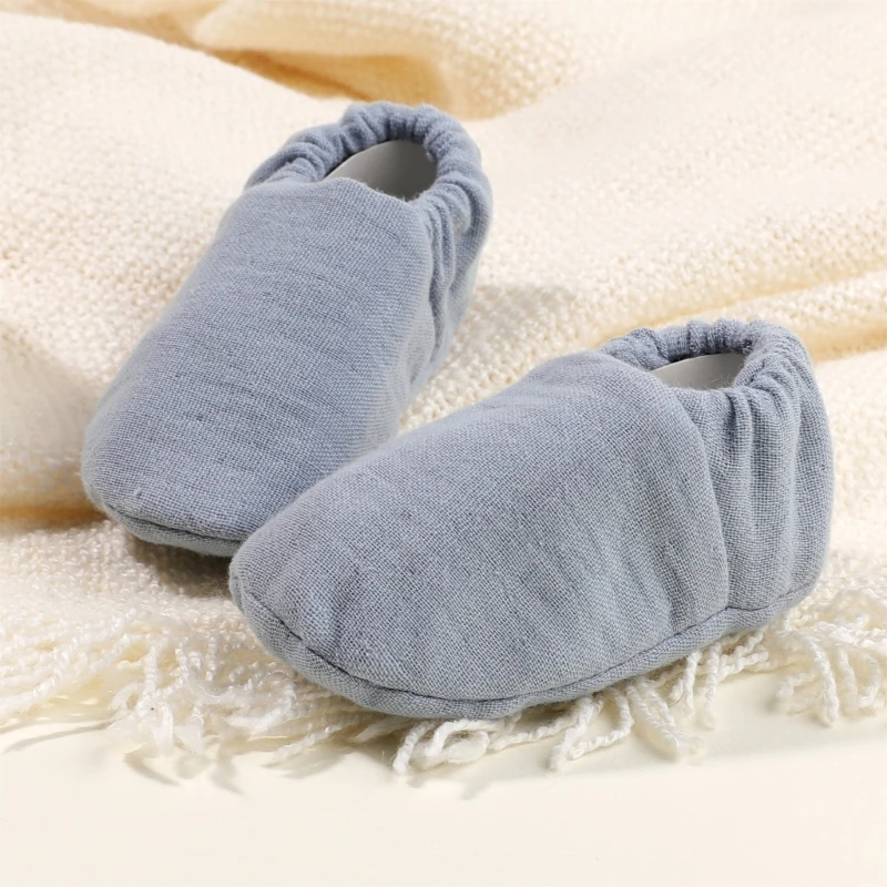 Giày trẻ sơ sinh mềm mại và thoải mái mới Giày bốt trẻ bằng vải cotton thoáng khí Nonslip Ấm cúng