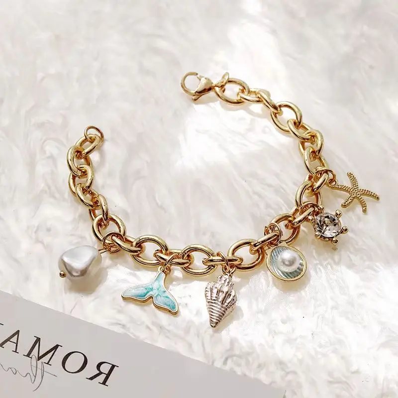 

Women Bohemian Enamel Bracelet Gold Metal Chain with Starfish Shell Conch Charm Ocean Style Wristband Bangle Jewelry