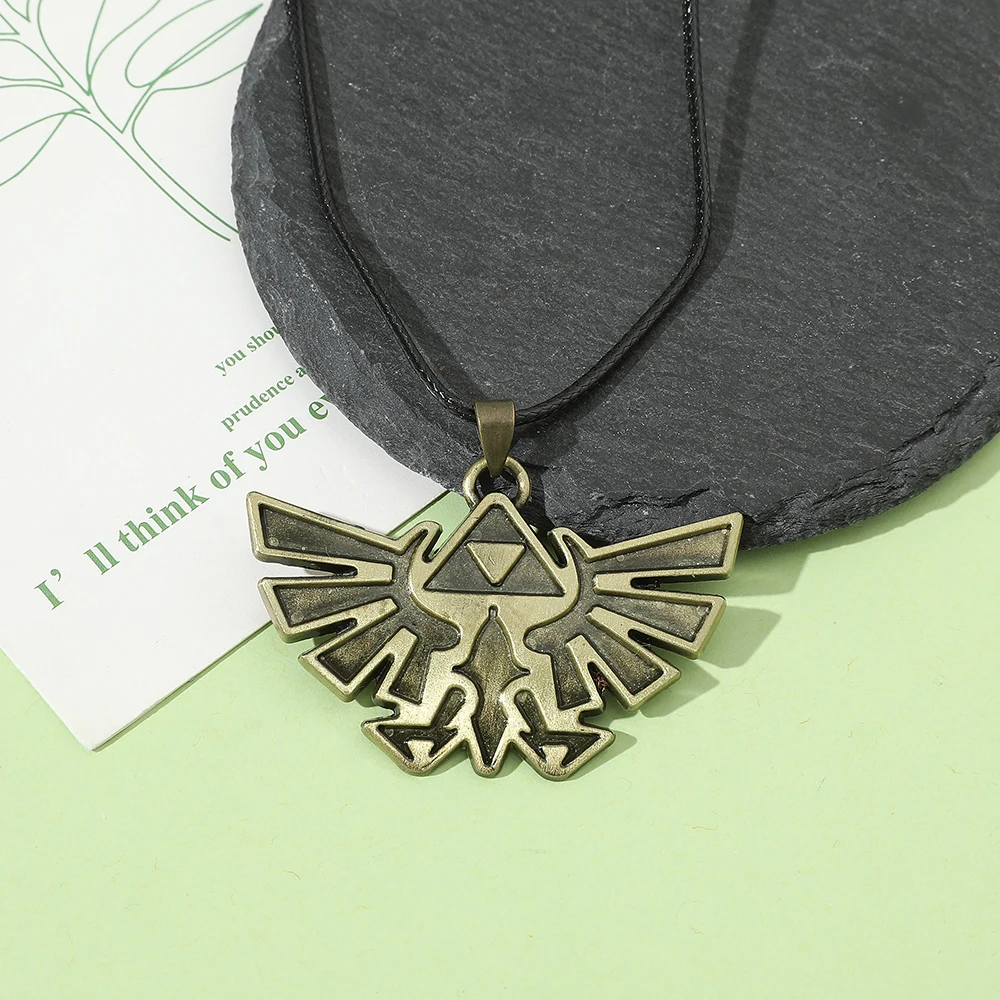 Legend Hylian Shield Sheikah Eye Majora's Mask Sword Triforce Symbol Pendant Zelda Tears of the Kingdom view 3
