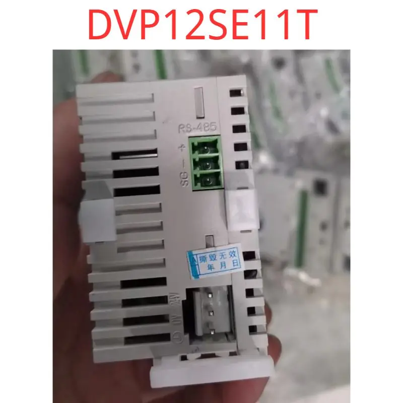 Second-hand test OK DVP12SE11T Delta DVP12SE11T Delta DVP-12SE PLC