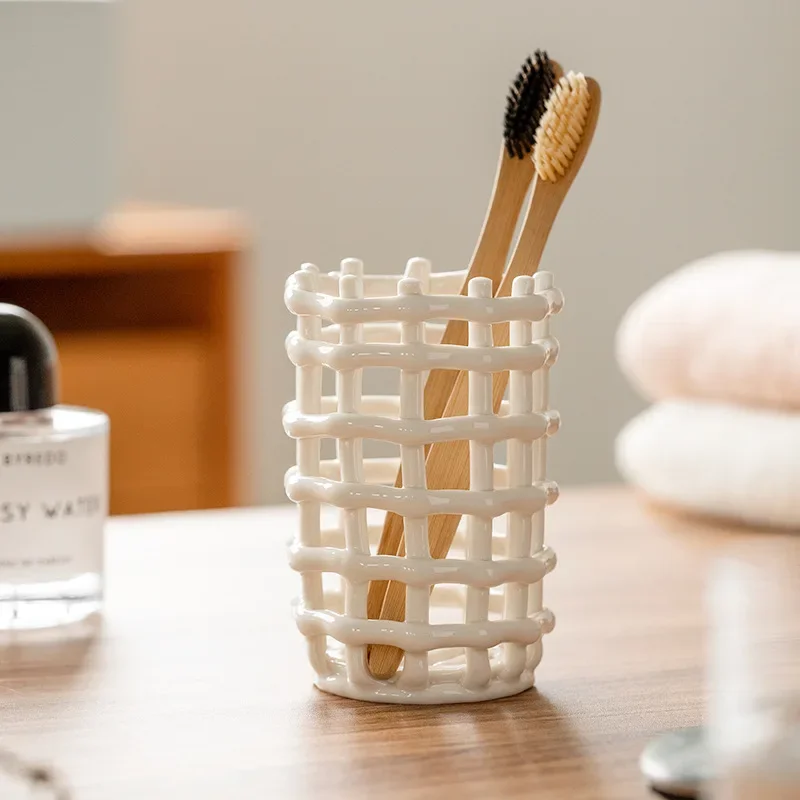 

Modern Toothbrush Storage Cup, Ceramic Woven Design Holder, Smooth Glossy Finish Organizer, Elegant Compact Vanity Caddy