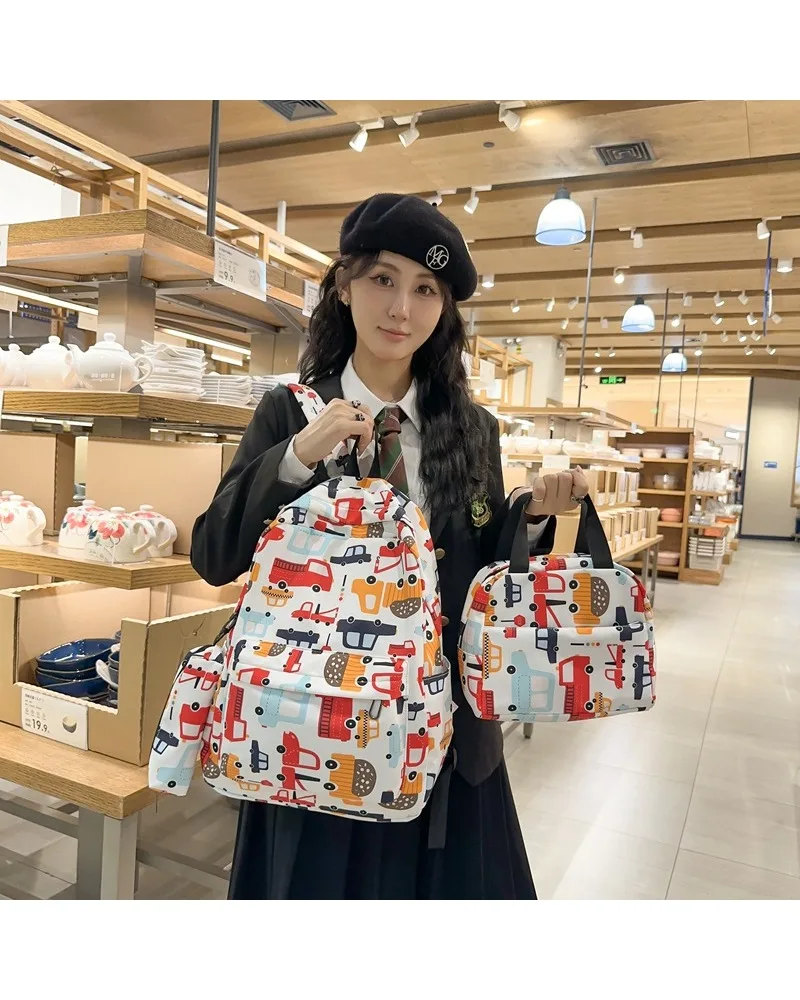 Campus wind gradual change three-piece student bag female fresh sweet floral backpack light make-up class portable backpack