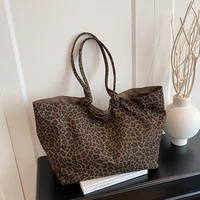 Bolso de mano con estampado de leopardo a la moda para mujer, bolso de hombro para ocio y desplazamientos, bolsa de almacenamiento de textura Simple grande, uso diario informal