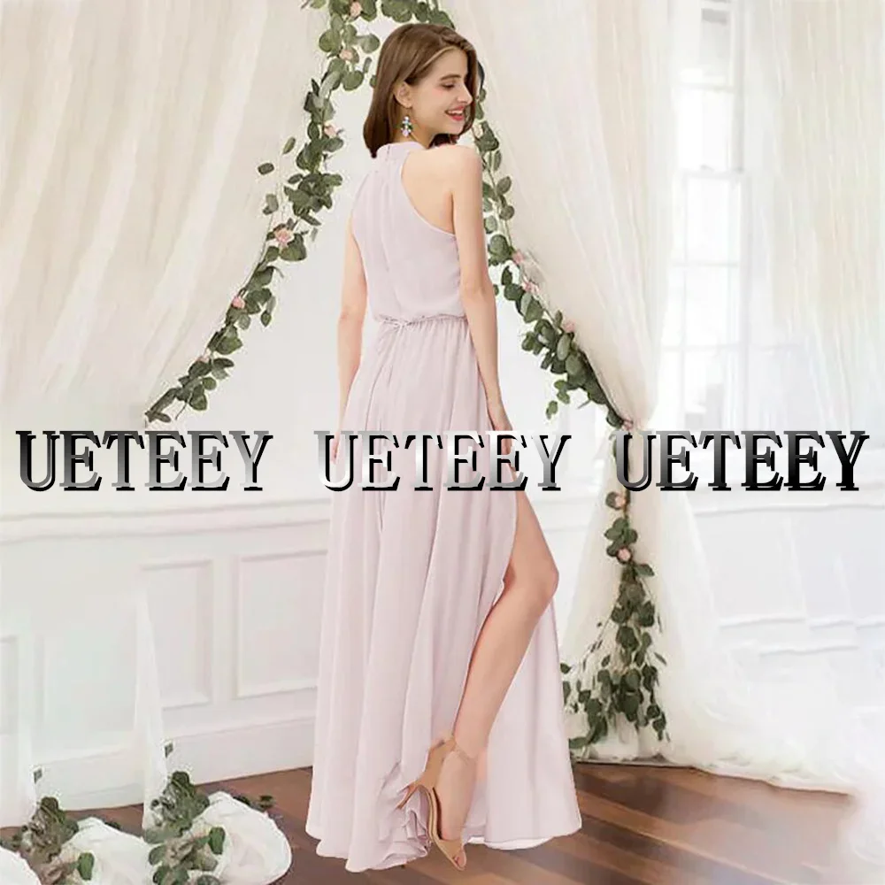 Abito da damigella d'onore a colonna personalizzato Collo alto senza maniche Elegante lunghezza pavimento Abiti da festa di nozze in chiffon Piega frontale divisa