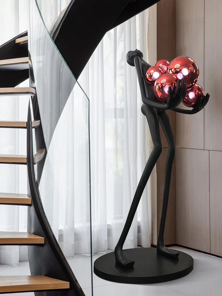 Nordic humanoid statue sculpture floor lamp, long arm holding ball, creative design exhibition hall, hotel sales office ornament