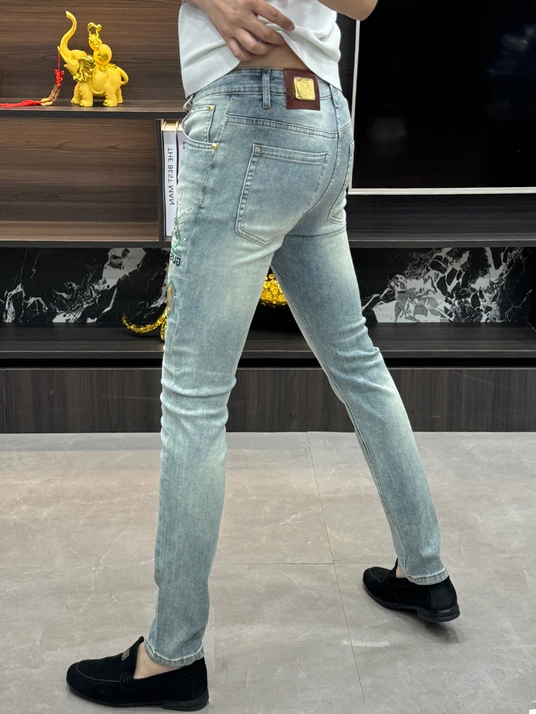 Trendy Men's Jeans with Embroidered Letters Elastic Waist Diamond Studded Casual Fashionable Slim Fit Jeans for Youth
