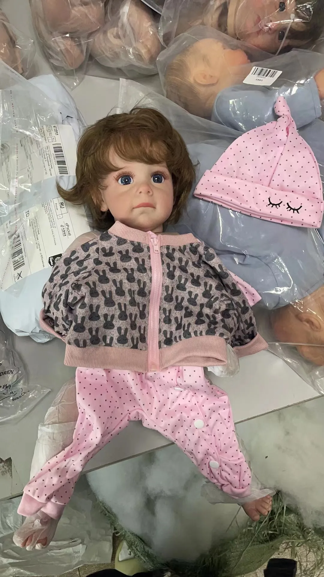 55CM Bebe Doll Reborn Toddler Maggi In capelli castani con radici Soft Touch 3D Skin con vene visibili bambola d'arte di alta qualità