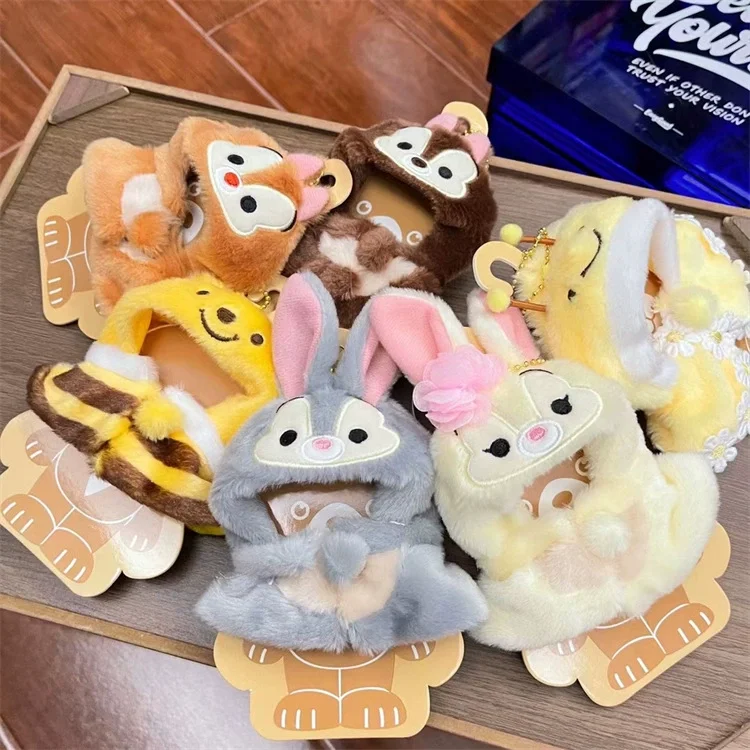 ตุ๊กตาสติทช์ขนาด 10 ซม. พร้อมเสื้อผ้า จี้ห้อยน่ารัก การ์ตูน ตุ๊กตาผ้าพลัฌ คุโรมิ พวงกุญแจ เสื้อคลุม หูฟัง อุปกรณ์เสริมตุ๊กตา ของขวัญสำหรับเด็กผู้หญิง