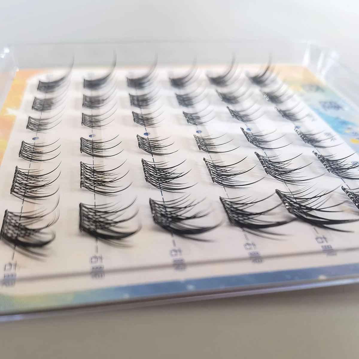 ไม่มีกาวไม่มีการกําจัดขนตาปลอม 36/48 กลุ่ม Foxy Daji Lashes C Curl ผสม Lash กลุ่ม 9-14 มม.เทปที่มองไม่เห็นผู้หญิงแต่งหน้า