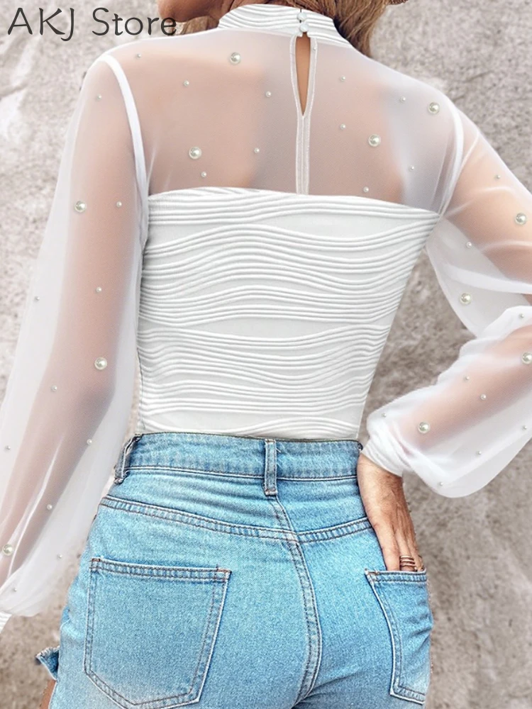 

Прозрачные сетчатые блузки с жемчужным декором и рукавами-фонариками, облегающий топ