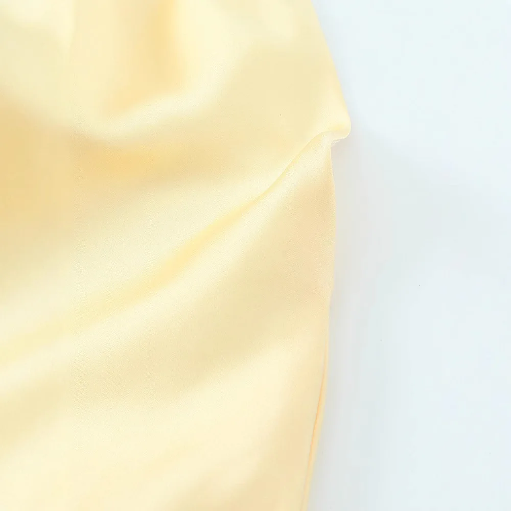 Nouveau décontracté jaune bretelles à lacets Robe élégante sans manches taille haute mince 2025 été mode vacances Chic Robe