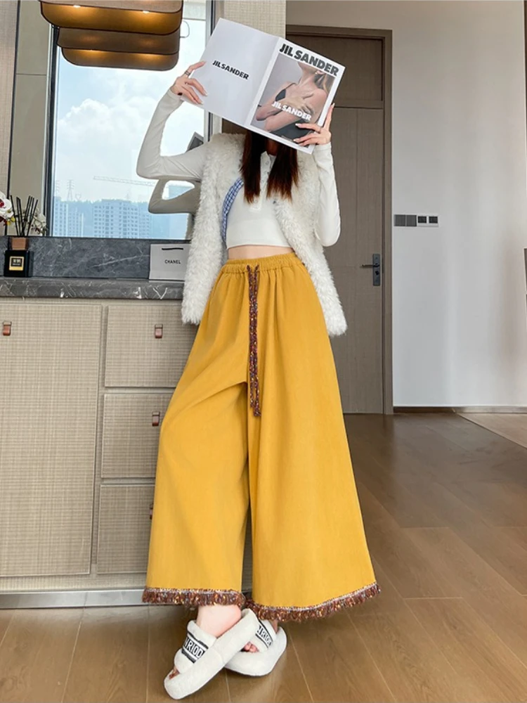 Retro corduroy tassel wide leg pants women's autumn and winter loose and super beautiful 9-point casual large leg skirt