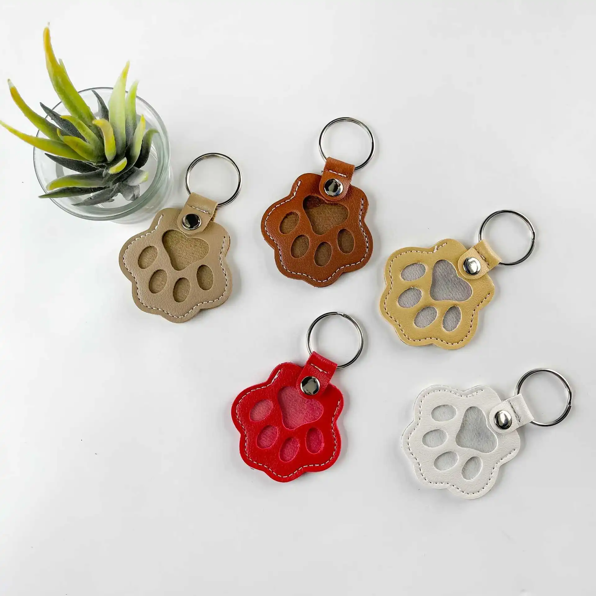 Leder Schlüsselanhänger Kreativität Haustier übrig gebliebenes Haar Aufbewahrungsanhänger Kitty Hund Haar Exquisiter süßer Handtaschenanhänger