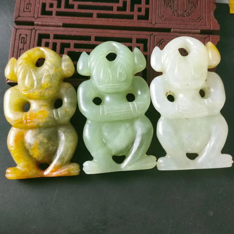

Natural Stone Craft Xiu Jade Aged Red Mountain Culture Sun Man Handheld Ornament