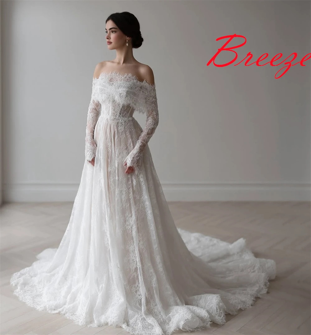 Op maat gemaakte witte organza trouwjurk van hoge kwaliteit, prachtige boothals, lange mouwen, kapelsleep, kanten rugloze bruidsjurken