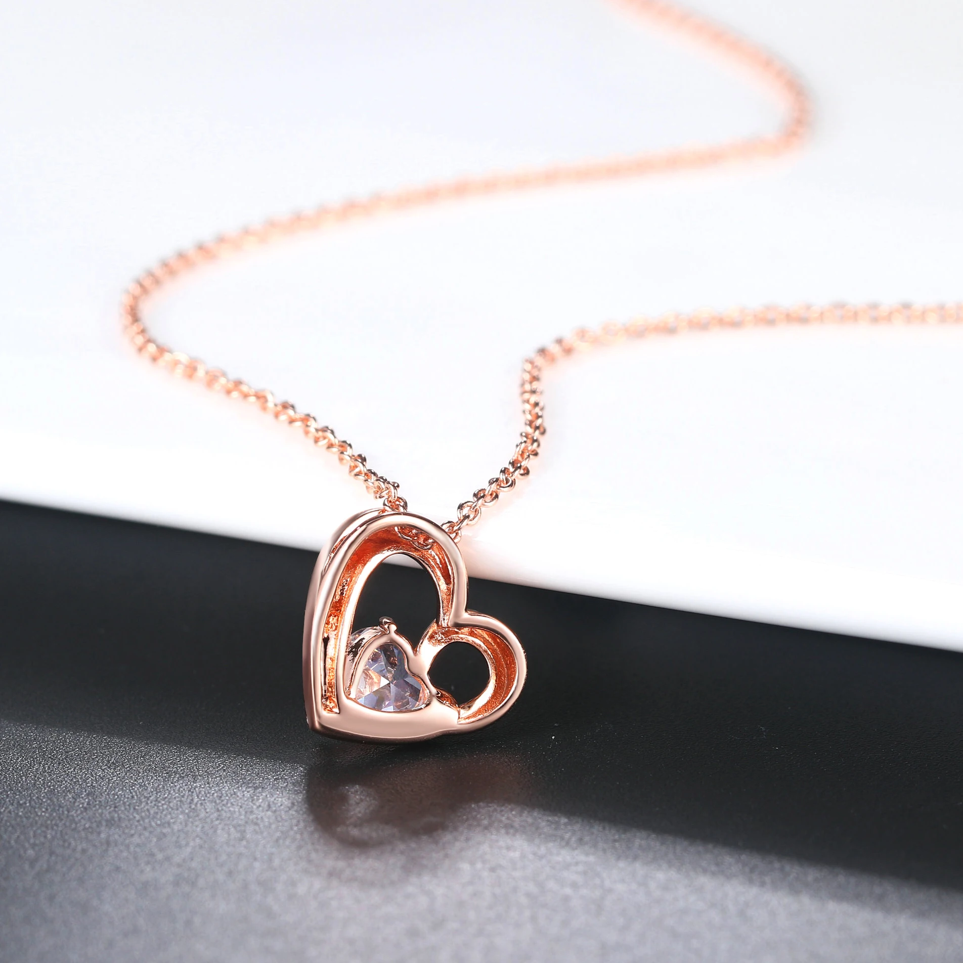 ZHOUYANG Pendant Necklace For Woman Girl Sweety Hollow Out Heart To Heart Cubic Zirconia Fashion Jewelry Party Work Gift N056