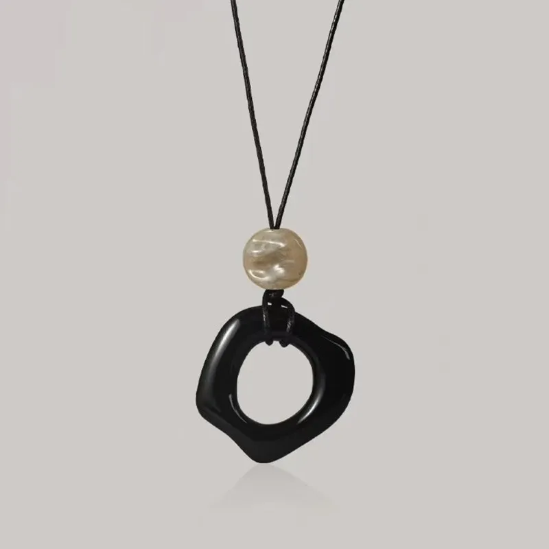 

Geometric Irregular Black Long Pendant New Chinese Style High-end Feel Sweater Chain Individual Simple And Versatile Necklace