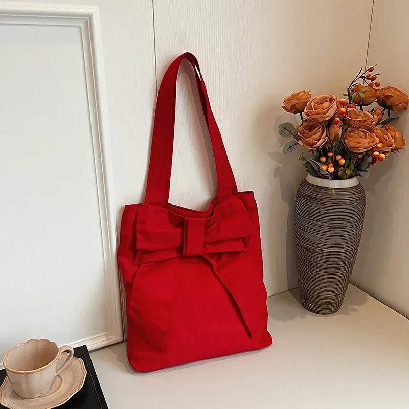 Canvas Material 2024 New Shoulder Bag Solid Color Bow High Capacity Simple Fashion Handbag Soft Versatile Popular Tote Bag