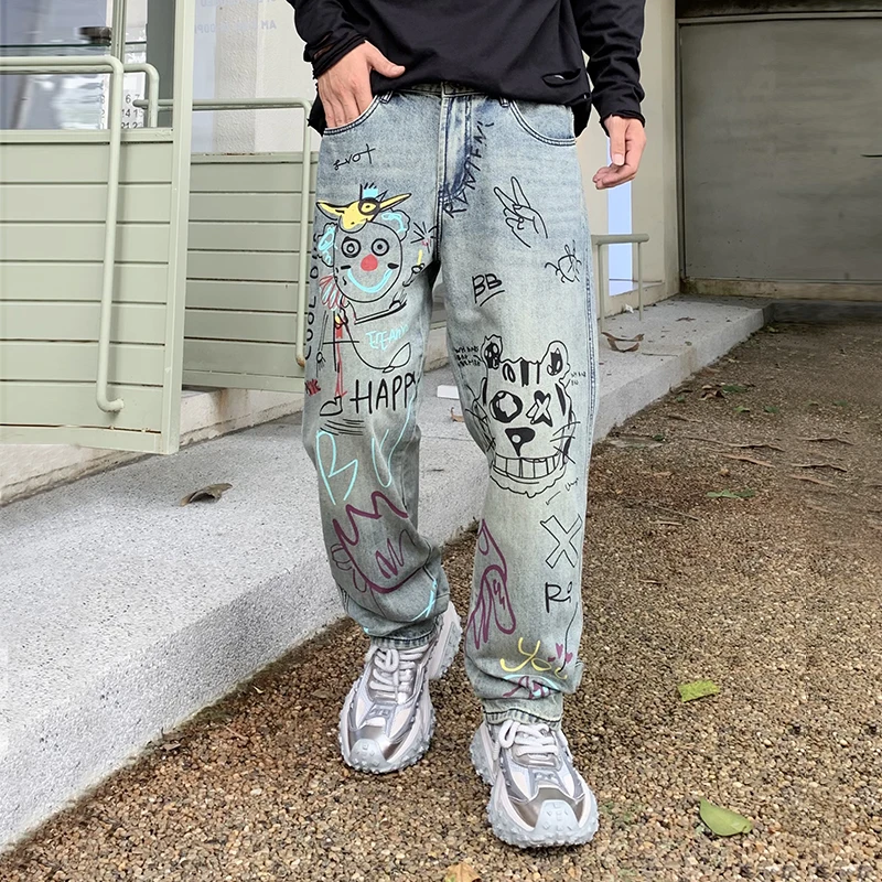 Streetwear jeans grafiti pria, celana kasual peplum kaki lebar lurus longgar populer jalanan Amerika kelas atas