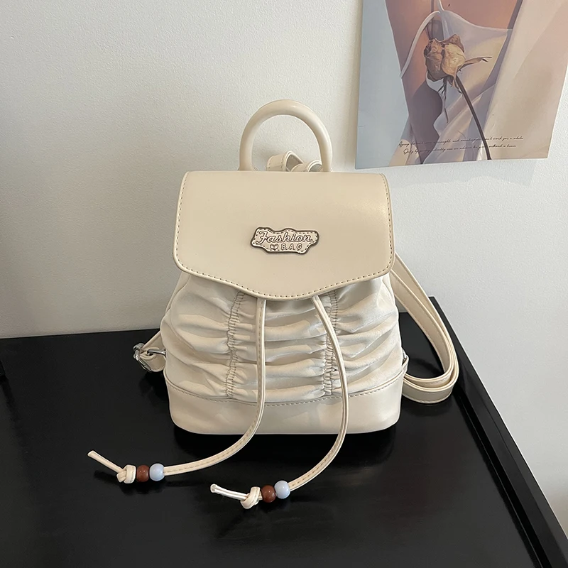 

Solid color pleated women's backpack, backpack, single shoulder bag, college style, student white-collar commuting