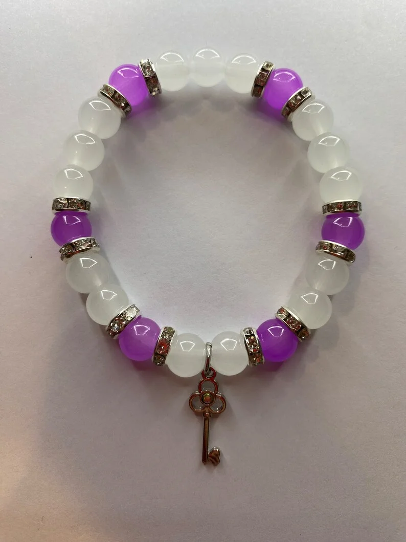 

Purple and white beaded bracelets