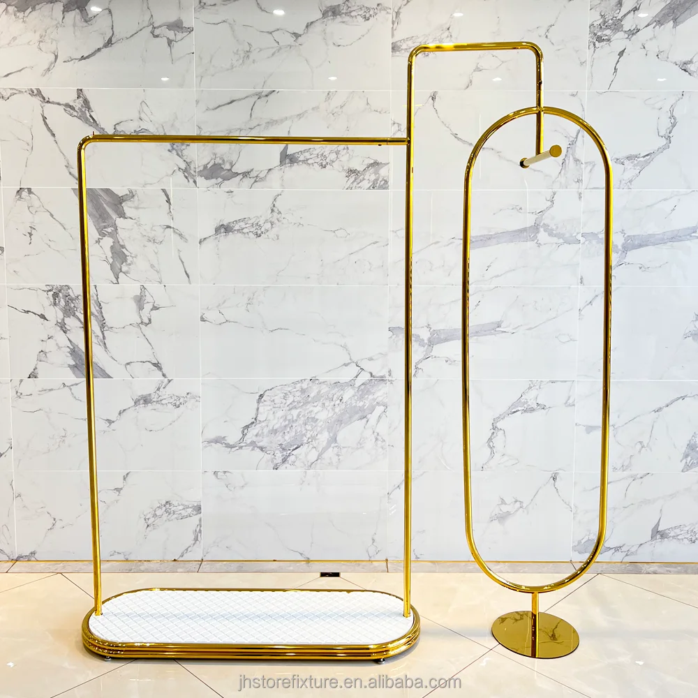 Percha de ropa de acero inoxidable de lujo, dorada brillante, personalizada, de pie, con estantes de exhibición para tienda