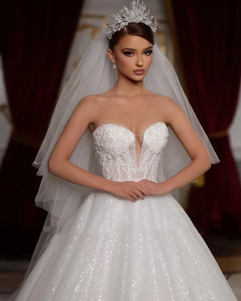 فساتين زفاف Flavinke مخصصة وصلت حديثًا برقبة على شكل قلب في جميع أنحاء مطرز باللؤلؤ والترتر اللامع 2025 Vestido De