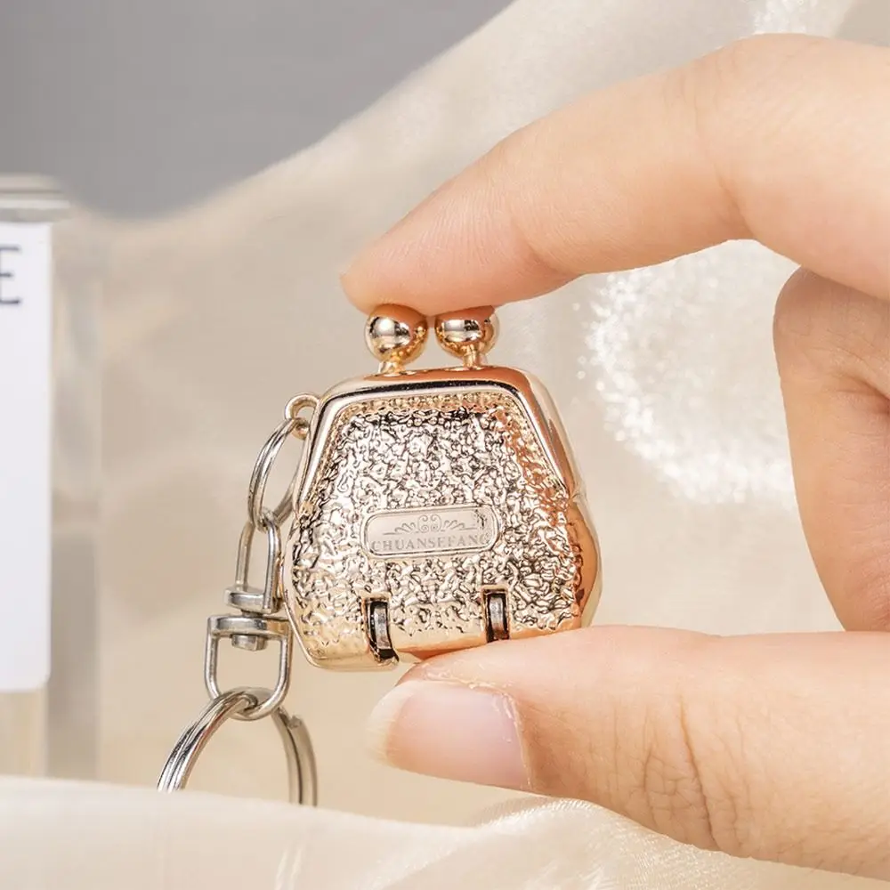 Neue Edelstahl Fingernagelknipser Trim Nägel Nagelwerkzeug Nagelschneidezange Faltbares Gepäckfach Schlüsselanhänger für Unisex