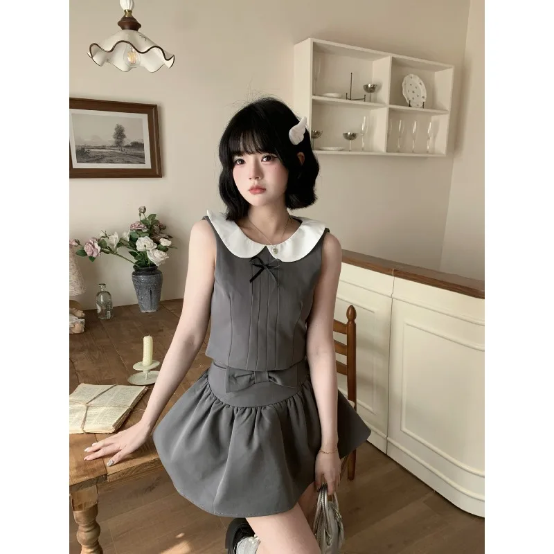 Korean Vintage Harajuku Gold Feeling Sweet Doll Collar Vest Top Temperament Bow Half Skirt Street Shot Ins Two-piece Set 니트 스커트