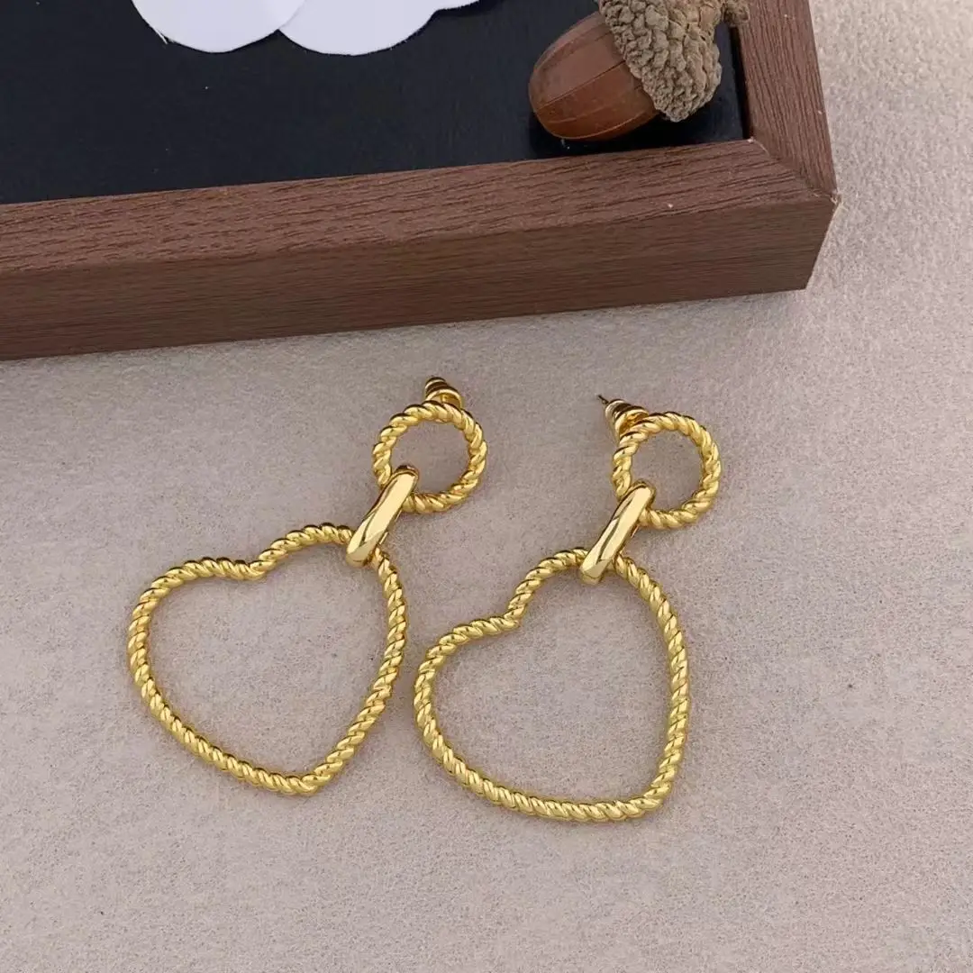 

Niche trend retro Copper plated with 18K gold earrings for women's girl eardrop jewelry wholesale