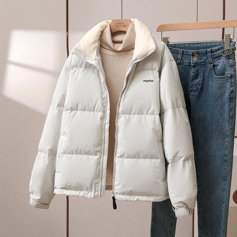 女性用の白いダックダウンジャケット,韓国スタイル,スタンドカラー,厚くて暖かいアウター,ゆったりとしたカジュアルコート,特大,秋冬