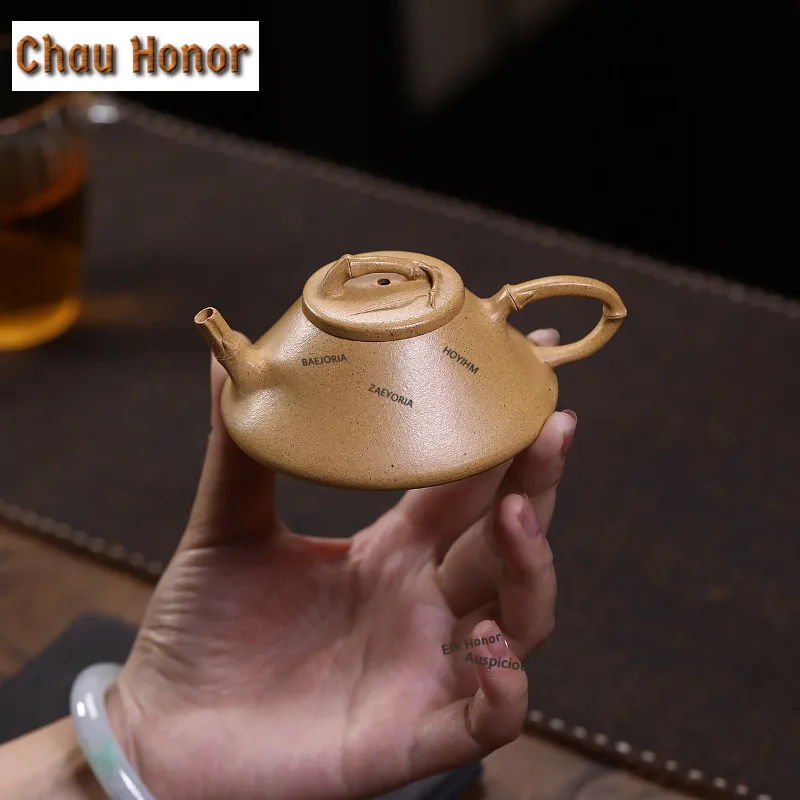 

Чайник из исинской фиолетовой глины 90 мл, ручной работы, с бамбуковой ручкой, из необработанной золотистой глины, с ситечком, китайский чайный набор из глины цзыша