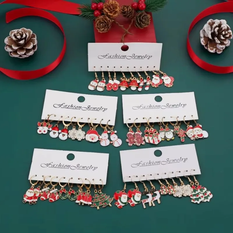 Conjunto de aretes navideños Diseño creativo Papá Noel Muñeco de nieve Copo de nieve Estrellas Pendientes y aretes de árbol de Navidad