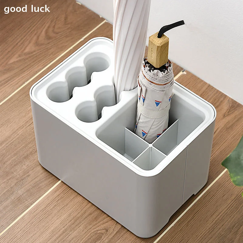 

Подставка для зонтов с поддоном для сбора воды, экономит место, подходит для размещения в углу прихожей, вмещает 10/15 зонтов