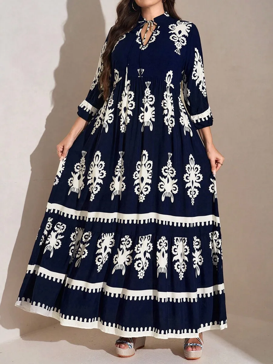 

Navy Blue White Floral Print Maxi Dress with Tiered Skirt and Keyhole Neck