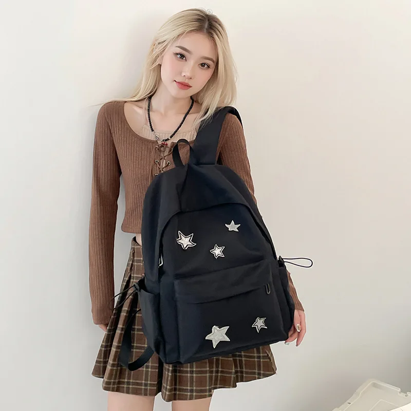 Nylon lightweight student backpack, five-pointed star contrasting color, large-capacity black dirt-resistant travel backpack