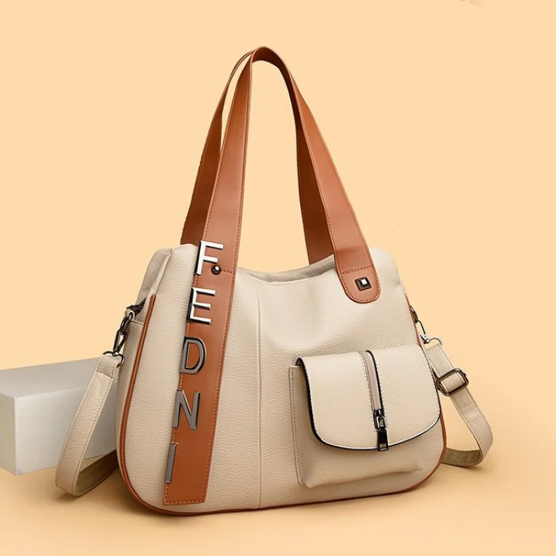 

Classic Leather Messenger Bag For Women, Spacious Design With Secure Zipper, By Luxury Brand, Ideal For Professionals