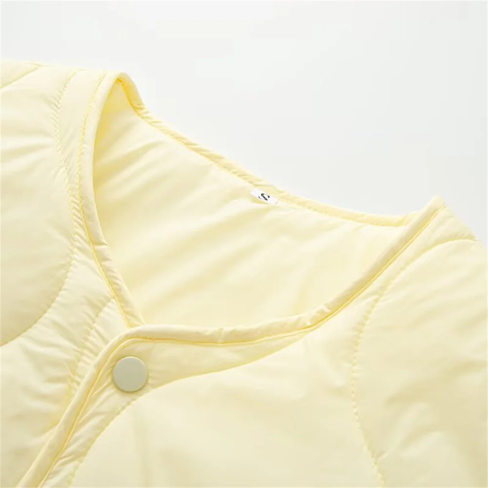 مجموعة الخريف النسائية الجديدة بسيطة وغير رسمية متعددة الاستخدامات ورقبة دائرية وشبكة الماس معطف من القطن معطف سميك