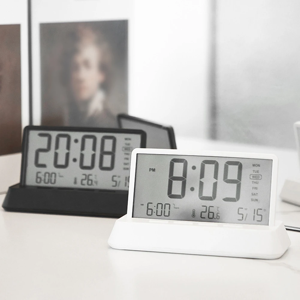 

Electronic LED Clock with Transparent Display Time Management Functions Including Alarm Temperature Readings and Snooze Feature
